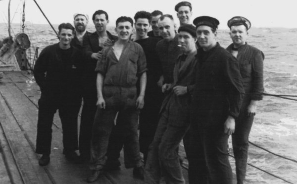 Herbert Poore 4th form left, with fellow Stokers at sea with HMS Acasta